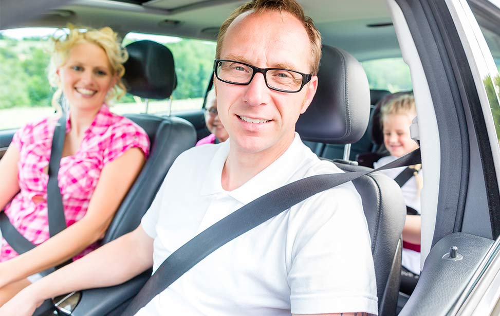 Family driving a car image